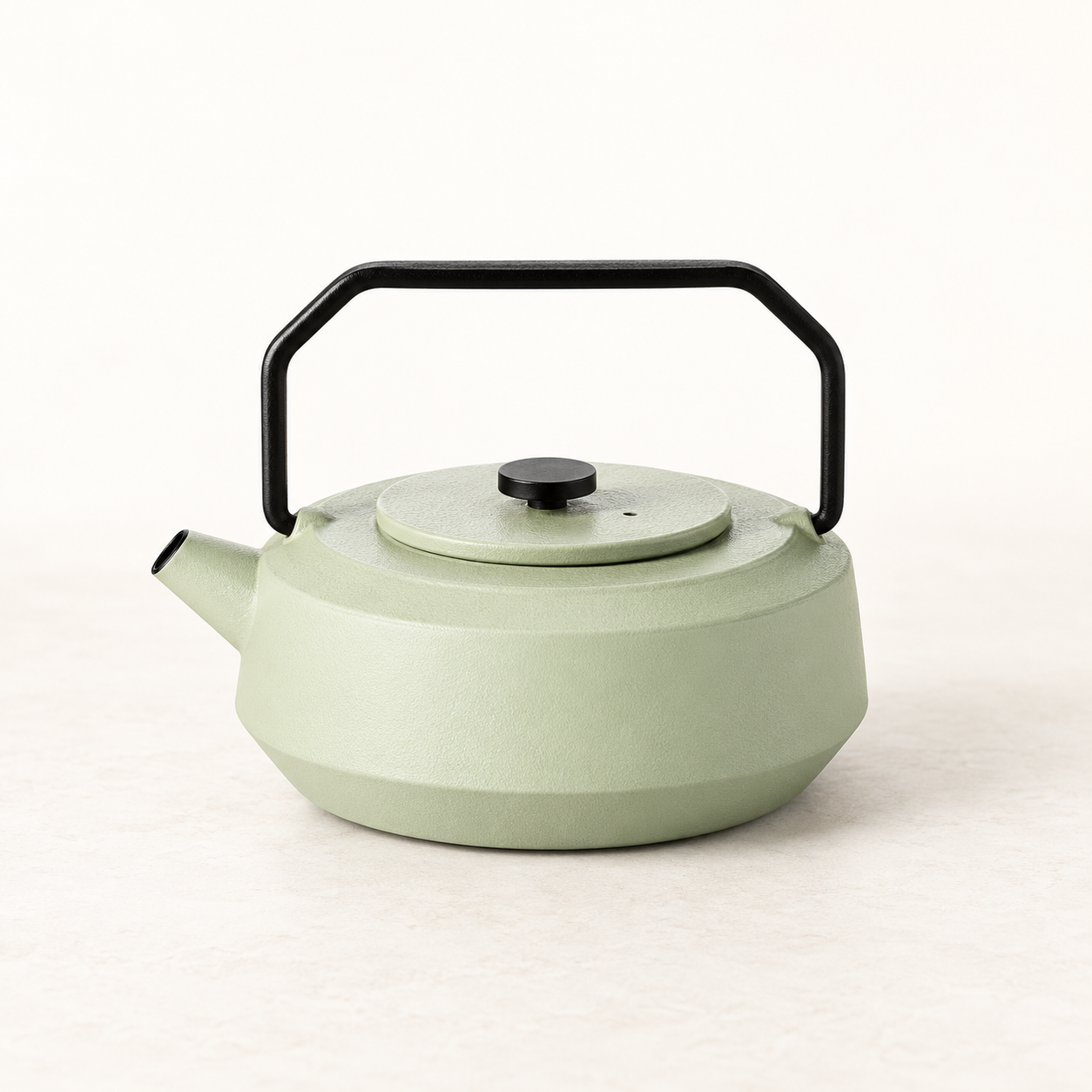 Kanne Yini Gusseisen mint-schwarz – TEEMANDO Atelier