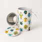 TEEMANDO Atelier-Hauptbild – Jumbo-Kräuterteetasse Happy Monsters, Tasse mit Deckel und Edelstahlsieb