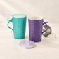 Teamug Skadi – 2-fach sortierte New-Bone-China-Kräuterteetasse mit Edelstahlsieb, Atelieraufnahme